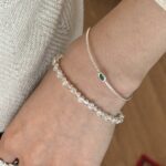 Multi-layered silver bracelet featuring vertical stripes and blue zirconia stones - Image 3