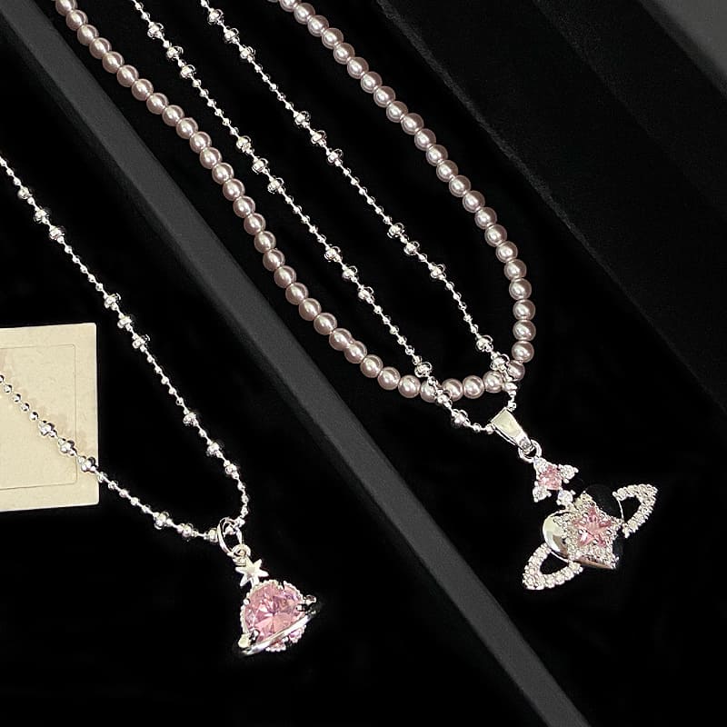 O1CN01V3jCK92N9sRvch7qA_!!2214032549921-0-cib Pink Zircon Heart Planet Necklace - Image 1